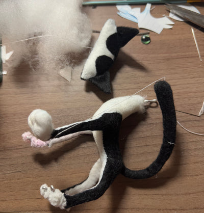 Long-legged cow cat plush character
