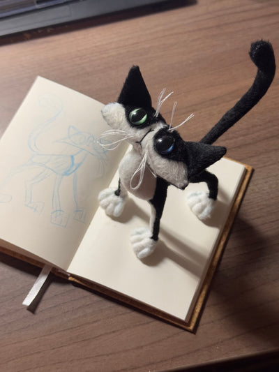 Handmade cow cat with exaggerated features